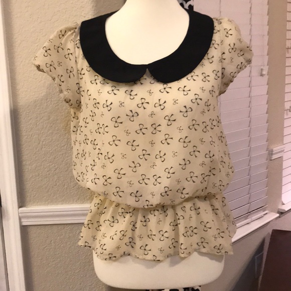Tops - Black and Tan bow print sheer top